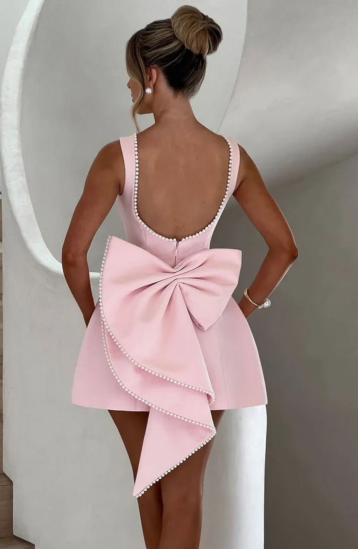 Festliches A-Linien Cocktailkleid für Damen, ärmellos, mit Perlen & Schleife. Ideal als Hochzeitsgast-Kleid.