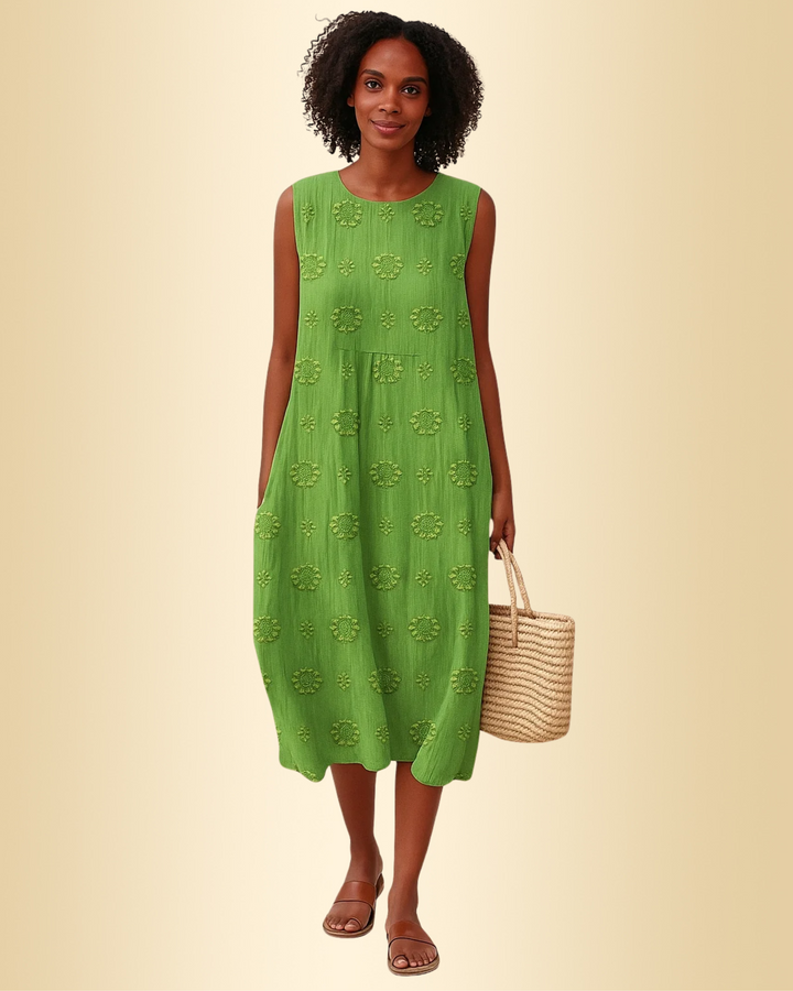 Ärmelloses Damen Sommerkleid mit farbenfrohem Blumenmuster, locker und bequem. Ideal für Freizeit und Urlaub.