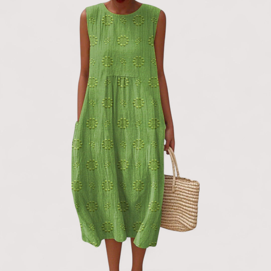 Leichtes Freizeitkleid für Damen, ärmellos, mit elegantem Blumenprint, perfekt für warme Tage und Urlaub.