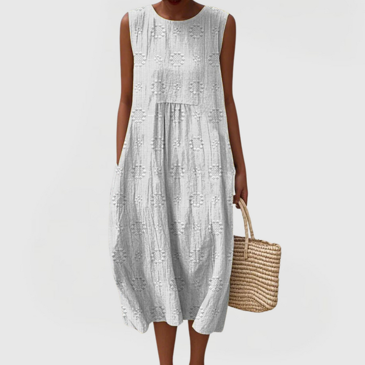 Stilvolles Damen Freizeitkleid, ärmellos, mit lockerer Passform, praktischen Seitentaschen und zarter Stickerei.