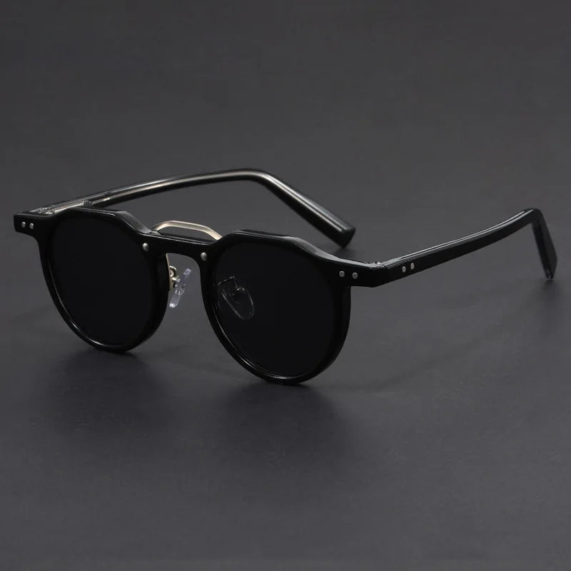 Klassische runde Vintage-Sonnenbrille für Herren mit polarisierten Linsen, optimaler UV-Schutz, stilvolles Accessoire.