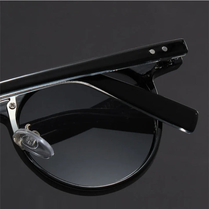 Leichte runde Herren Sonnenbrille im Retro-Design mit polarisierten UV-Schutzgläsern, komfortables Modeaccessoire.