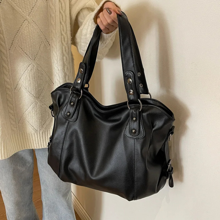 Geräumige Damen Tragetasche mit verstellbarem Gurt. Vielseitige Schultertasche für den täglichen Gebrauch.