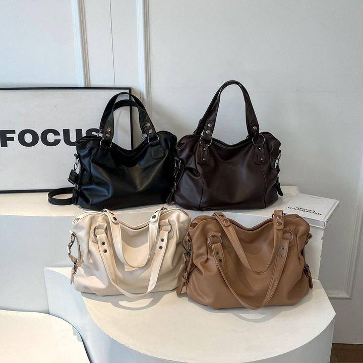Modische Damen Tragetasche in Schwarz. Große Umhängetasche mit verstellbarem Gurt, perfekt für Beruf & Freizeit.