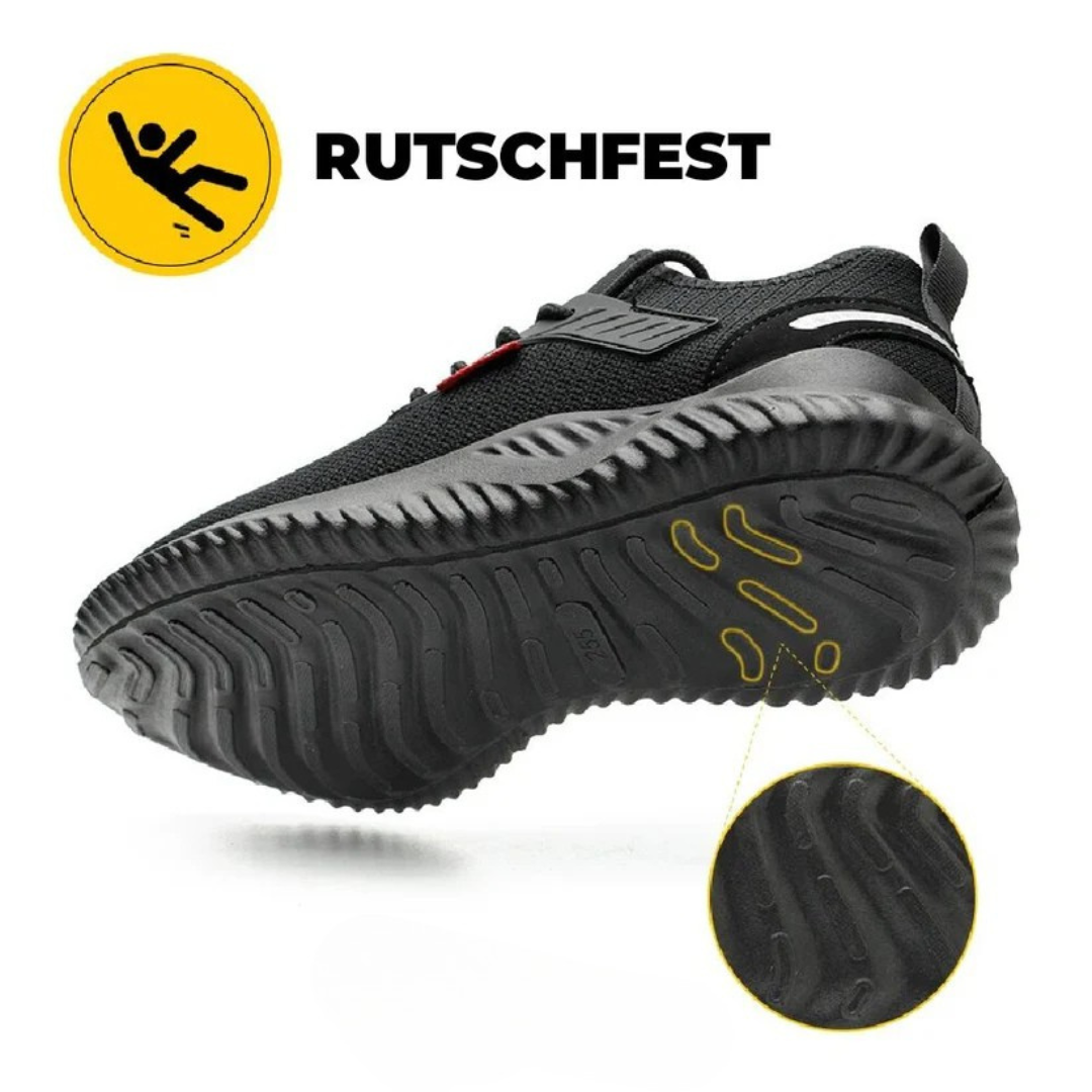 Ein Paar schwarze, knöchelhohe Herren-Sicherheitsschuhe, rutschfest und durchtrittsicher, für Berufsbekleidung.