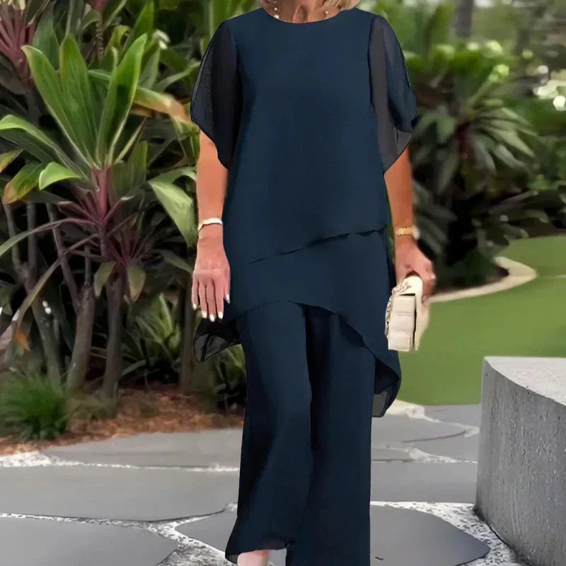 Marineblaues, elegantes Damen-Set mit asymmetrischem Top & weiter Hose; komfortabler Zweiteiler.