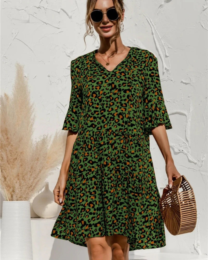 Bequemes Damen Midi-Sommerkleid mit Puffärmeln, farbigem Blumenmuster & kurzem Arm, ideal für Freizeit.