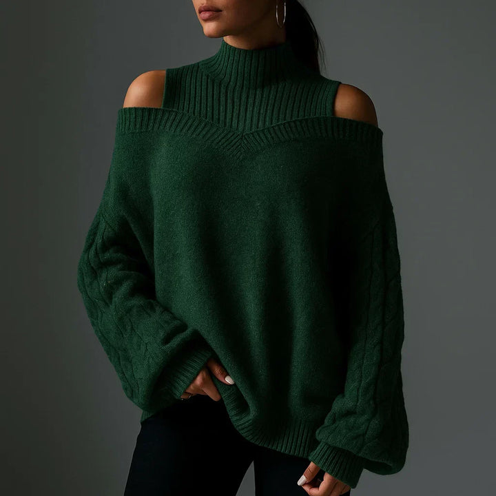 Winterlicher Damenpullover, langarm, mit Rollkragen, schulterfrei und detailliertem Strukturmuster.