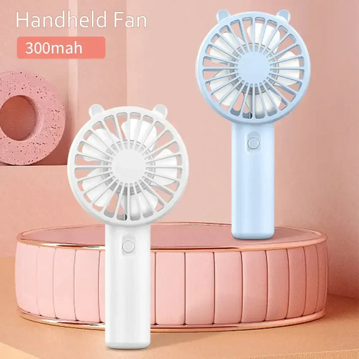 Wiederaufladbarer Mini-Handventilator in modernem Design. USB-betrieben, ideal für Reisen, Schreibtisch & Garten.