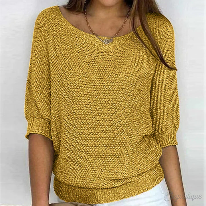 Nahaufnahme des eleganten Louisa Strickpullovers. Textur und Langarm-Details des Damen Pullovers.