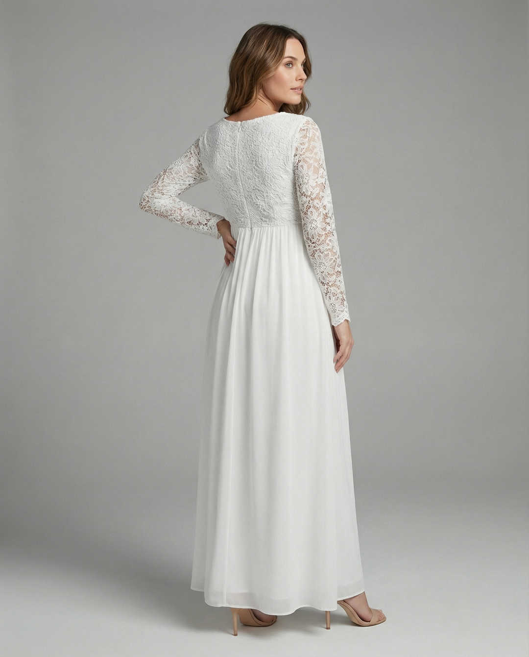 Festliches Damen Langarm-Kleid in Weiß mit modischen Ausschnitten, perfekt für elegante Anlässe.